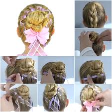 The bun is styled high with two braids at the back and there are braids in the actual bun too. How To Diy Fancy Braided Hair Bun With Woven Ribbon Diy Tutorials