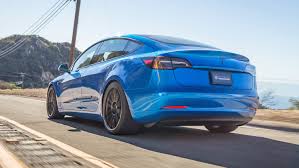 To contrast the color, a satin black chrome delete and matte black 19. Unplugged Tesla Model 3 Review Modified Car Rivals M3 Top Gear