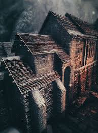 To the right is a small square table and two chairs with fancy crockery on the table. The Elder Scrolls V Skyrim Windhelm Skyrim Wallpaper Fantasy Places Fantasy City