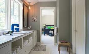 Make sure to install a lock on each door so everyone can use the bathroom themselves. Jack And Jill Bathroom Design Transitional Bathroom