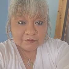 New board president, Alex Gorobetz, and VP Mary Alice Espiritu, being sworn  in Monday evening.