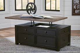 Styled with a rustic farmhouse chic feel, it has a lift top and multiple drawers, making it an ideal laptop workstation. Tyler Creek Coffee Table With Lift Top Ashley Furniture Homestore