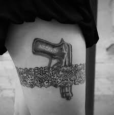 60+ examples of thigh tattoo ideas (flowers, animals and etc) 5. 50 Lace Belt Garter Tattoos Designs 2021 Gun Bow On Thigh Leg