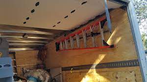 I have a jet rack set up in the box that uses the strut. Pin On Van Shelving