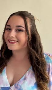 I'm in need of a professional smiley head shot against a white background  and I can't seem to find one. Don't suppose there's any slim chance that  someone can do anything with