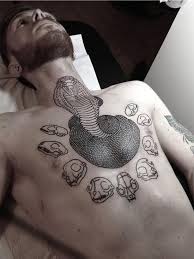 Negative space tribal arm sleeve polynesian chest & arm sleeve hawaiian half sleeve tribal arm tattoo full arm tribal design tattoo upper chest & arm tribal tattoo 170 Best Chest Tattoos For Men Ultimate Guide August 2021