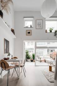 The mezzanine gallery spans the room, leading up to bedrooms on the uppermost floor. Small Ground Floor Apartment But With Front Garden And Mezzanine 30 Sqm Photos Ideas Design