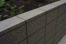 In our case, we also needed this new landscaping feature to serve as a small concrete block retaining wall below, and a freestanding wall above ground level. Block Honing Coatings And Flooring Applications For Concrete Concrete Retaining Walls Concrete Block Retaining Wall Landscaping Retaining Walls