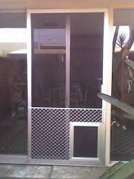 Maybe you would like to learn more about one of these? Superguard Grille And A Pet Door Screen Doors Window Screens