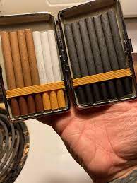 Crappy picture but what are the american spirits next to the lime green pack? I Like Variety Left To Right Is Djarum Splash American Spirit Black And Djarum Black Cigarettes