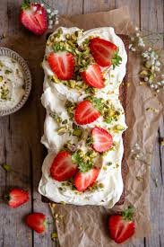 Add cream cheese mix to a piping bag or ziploc with the corner snipped off. Pistachio Cake With Strawberries Cream Inside The Rustic Kitchen