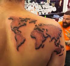 Peace pipe and feathers tattoo design. 230 Cool World Map Tattoos Designs 2021 Geography Continent