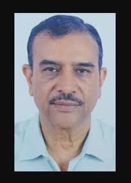 Shri Dhirendra Sharma