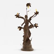 She represents a couple of young characters, mounted on a base. Louis Moreau Extremely Rare 1905 Astor Hotel Garden Roof Statue Lamp