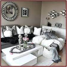 Bring in black hue by painting one of the living room's walls. Black Grey And White Living Room Accessories Silver Living Room White Living Room Decor Black And White Living Room