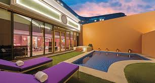 Rooms are serene and uncluttered as they open onto broad terraces, each with their own azure pool. Okada Manila Universal Entertainment Corporation