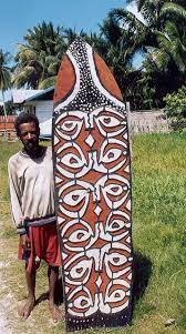 Papua Artisan With His Hand Made Carved Asmat Shield Tiki Art African Art Tribal Art