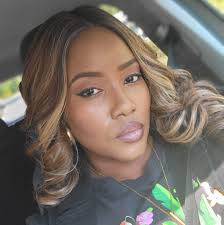 A white pink and grey cupcake bouquet with all the extras! Butterflies,  diamanté's and a diamanté topper 😍