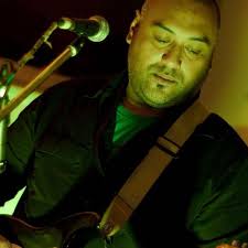 Rico Tali of #ardijah specialises in gat, vocals, sax, uke and can play  just about anything else. Is the longest serving member of the band apart  from director Ryan and lead singer