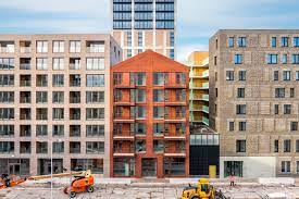 Management is all hot air and has no true control over security personnel that has women feeling unsafe. Apartment Building Red Ruby Bureau Fraai Archdaily