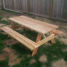 The standard picnic table has two benches attached to a table portion. Picnic Table Forest Trek Woodwork