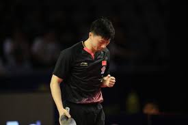 The game takes place on a hard table divided by a net. Ettu Org The Dragon Is Breathing Fire Once Again