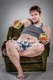 Fat guy eating a burger this burger bigger than my girlfriend. Fat Man Eating Hamburger Stock Photos Freeimages Com