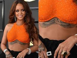 Rihanna decorated her chest with the wingspan of egyptian goddess isis, who was worshiped as the ideal mother and wife. The 10 Best And 10 Worst Celebrity Tattoos Of All Time Business Insider