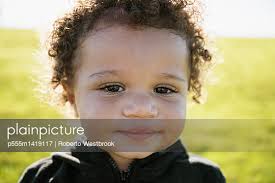 Plainpicture Plainpicture P555m1419117 Close Up Of Mixed Race Baby Deepol By Plainpicture Roberto Westbrook