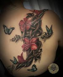 Butterflies hovering around flowers is one of the most popular tattoo idea for women and girls. 100 Amazing Butterfly Tattoo Designs Cuded