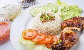 Cocok sekali dimakan saat musim hujan seperti yang membuat menu ini istimewa adalah kaldu ayam yang digunakan untuk menanak nasi. Popular Malaysian Dish Nasi Ayam Or Chicken Rice With Baked Chicken Stock Photo Picture And Royalty Free Image Image 39351224