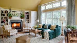 I like this for the living room. 13 Awesome Living Room Ideas With A Teal Sofa That Designers Love