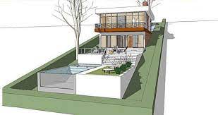 A Home Built On A Slope Interior Design Inspiration Eva Designs Sloping Lot House Plan Architecture House Hillside House