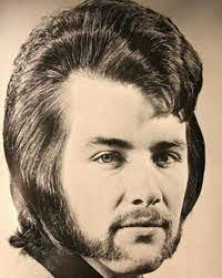 Feathered hair was popular in the 1970s and the early 1980s with both men and women. A Gorgeous Gallery Of Ultra Chic Men S Hairstyles From The 70s Dangerous Minds