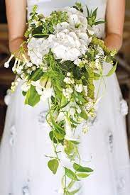 No matter what season your wedding is in, we've got the wedding flowers you need! Wedding Ideas Planning Inspiration Cascading Wedding Bouquets Spring Wedding Bouquets White Wedding Bouquets