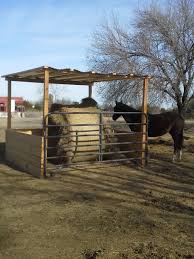 Our Round Bale Feeder We Ve Completely Eliminated Hay Waste Hay Feeder For Horses Horse Farm Ideas Diy Hay Feeder