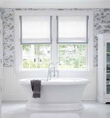 Shower curtain and window curtain should at the same height. 9 Bathroom Window Treatment Ideas Deco Window Fashions