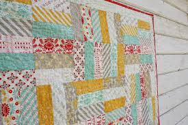 Jelly roll strips add texture to triangles. Easy Baby Jelly Roll Quit Pattern Diary Of A Quilter A Quilt Blog