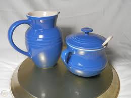 And now today, le creuset has officially released a new color for all of us to try on for size: Le Creuset Stoneware Cream And Sugar Set Indigo Creamer Set Dinnerware Solid 1787043314