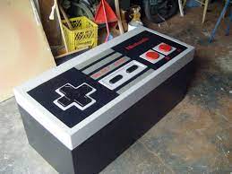 The extreme nes coffee table earns its name from the fact that it still works as an nes controller and has an nes built into it! How To Giant Nes Controller 9 Steps With Pictures Instructables