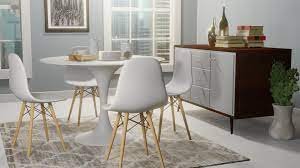 A mid century modern kitchen mixes minimalism with personality. Joseph Mathew Mid Century Modern Small Dining Room Interior