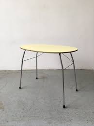 The locking hinges prevent the table from collapsing when opened. Mid Century Yellow Formica And Polished Steel Coffee Table With Folding Legs 1950s For Sale At Pamono