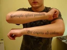 Most of the latin sayings may not be readily engraved in ink art, but they sure are an option for those stylish statements. Great Double Latin Quote Tattoo For Men On Arms Tattooimages Biz