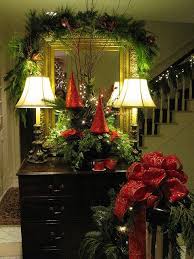 Mobile Bay Article Entrance We Used Red Glass Trees In With Fresh Greens Christmas Deco Christmas Decorations Beautiful Christmas