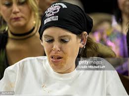 Molly Schuyler eats wings during Wing Bowl 23