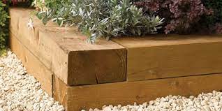 To further strengthen the structure, you can attach screws or hooks to the sleepers and then lay them on the concrete. Building With Railway Sleepers How To Cut Lay And Join Garden Sleepers
