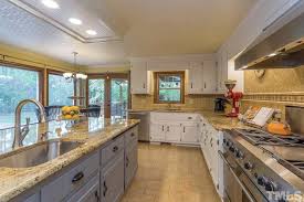 Painted kitchen cabinets are a hot trend in home decor, and one that's been around for a while. Ivory Lace Dovetail 2 Cabinet Girls