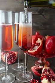 This Pomegranate Champagne Sparkler Is The Perfect Sweet Tart And Bubbly Celebration Co Champagne Sparklers Pomegranate Cocktails Champagne Recipes Cocktails