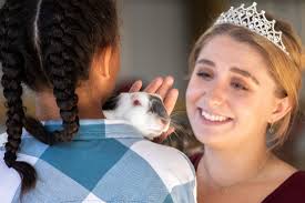 Round-Up royalty assists at fairgrounds