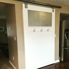 Diy Barn Door Covering Furnace And Hot Water Tank Home Furnace Furnace Room Door Coverings